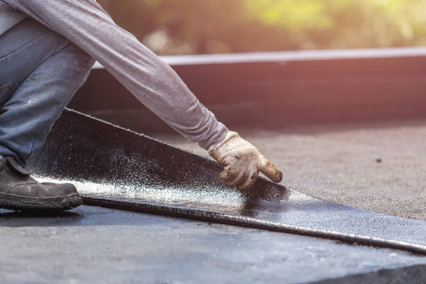 Professional Basement Waterproofing technician working in Holland, NY
